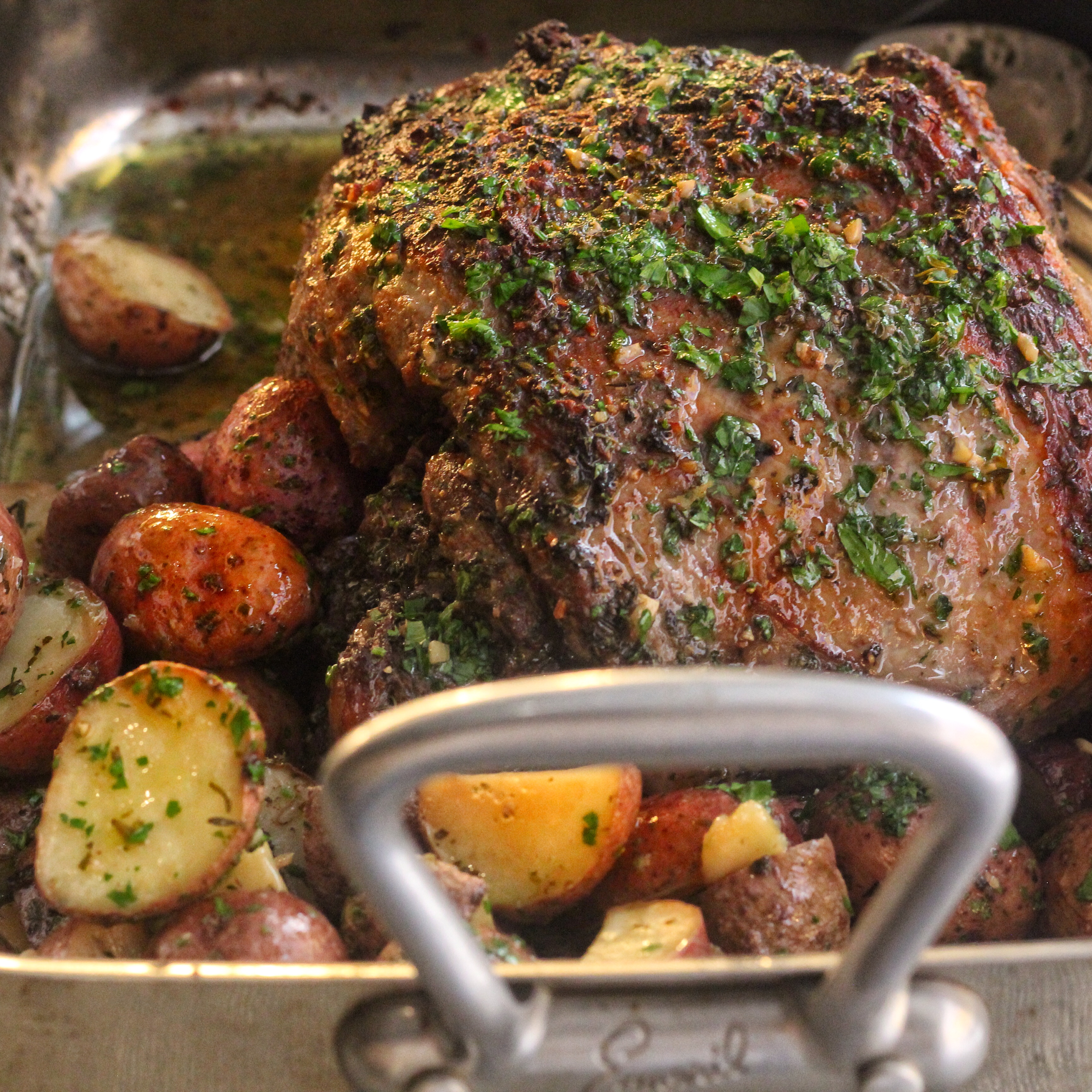 Herb Encrusted Roast Leg Of Lamb With Garlic Roasted Baby